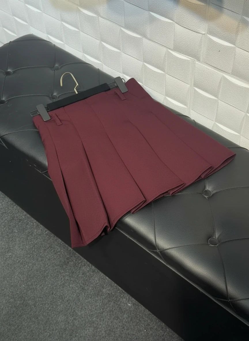 دامن زنانه کوتاه پلیسه همراه با کمربند کد 61206